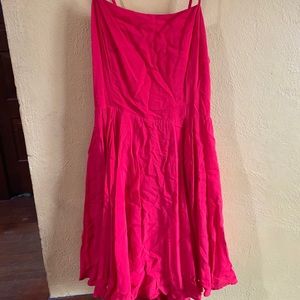 Red fit and flat dress with open back